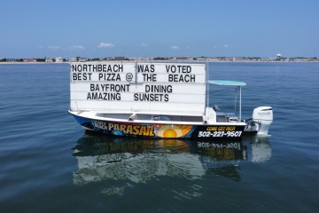 a small boat in a body of water